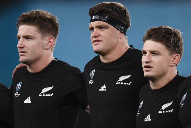 Beauden Barrett (R) lines up for the All Blacks alongside brothers Scott (C) and Jordie (L