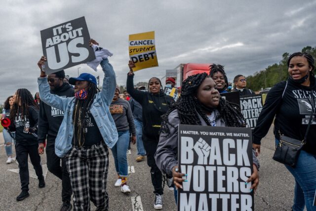 Black voters march in Alabama in 2022