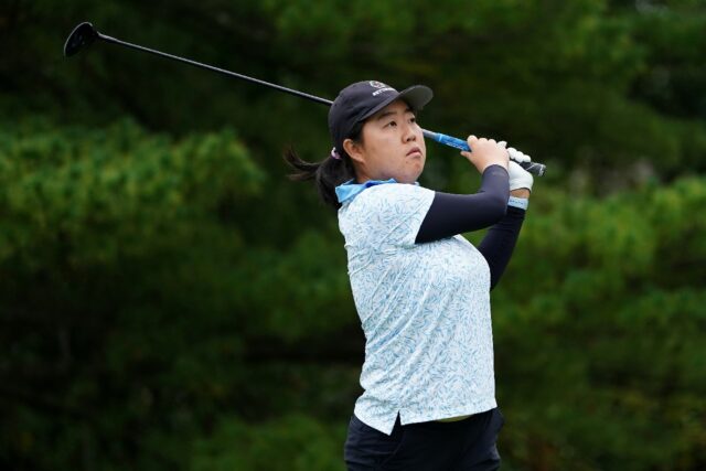 China's Liu Ruixin plays a shot on the way to the first-round lead in the LPGA Queen City