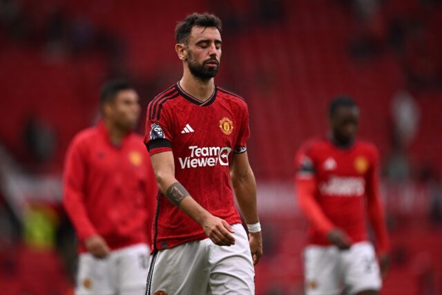 A dejected Bruno Fernandes leaves the pitch at Old Trafford after the 3-1 defeat by Bright