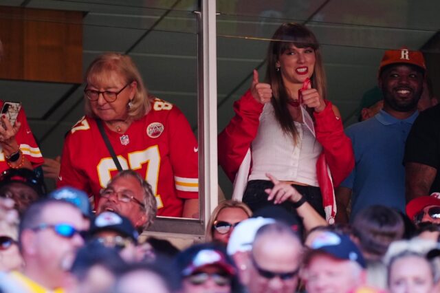 Donna Kelce, mother of Kansas City tight end Travis Kelce, and Taylor Swift are seen durin