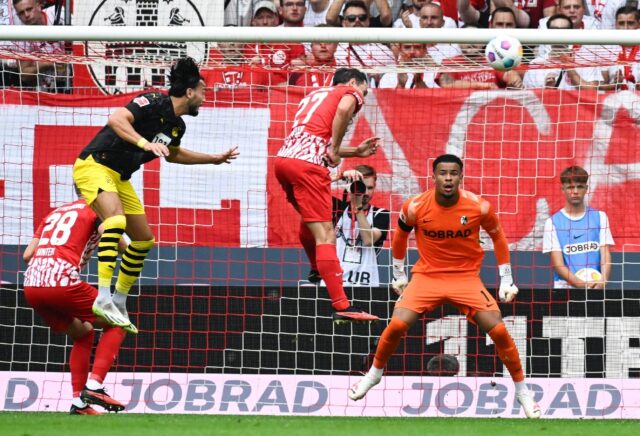 Dortmund defender Mats Hummels headed in two goals as his side won away at Freiburg on Sat