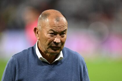 Eddie Jones apologised for Australia's defeat by Wales but denied he was leaving to coach Japan