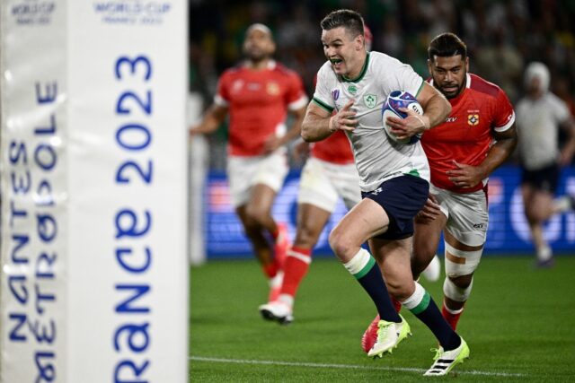 Johnny Sexton became Ireland's record points scorer and fired his nation to a convincing w