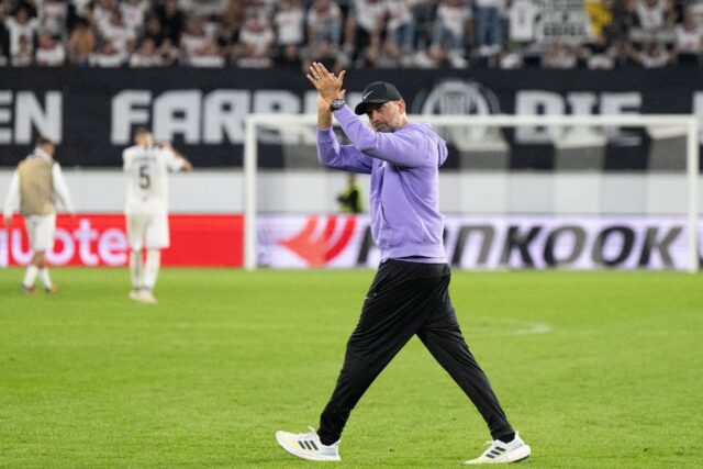 Jurgen Klopp salutes the crowd during his 50th European victory
