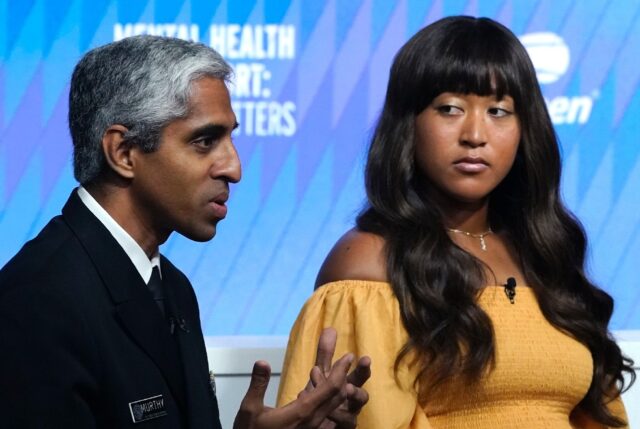 Naomi Osaka (R) took part in a mental health forum at the US Open