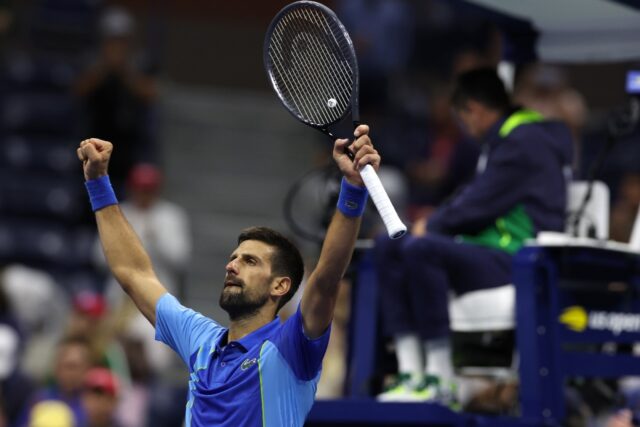 Novak Djokovic celebrates after his five-set victory in the US Open third round on Friday