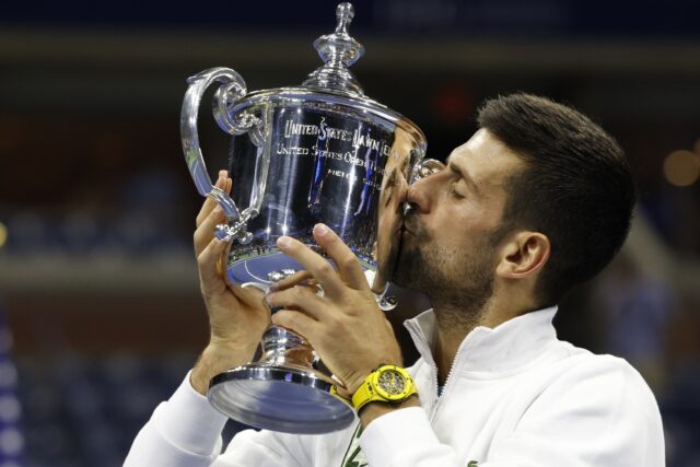 Serbia's Novak Djokovic celebrates after winning his record-equalling 24th Grand Slam titl