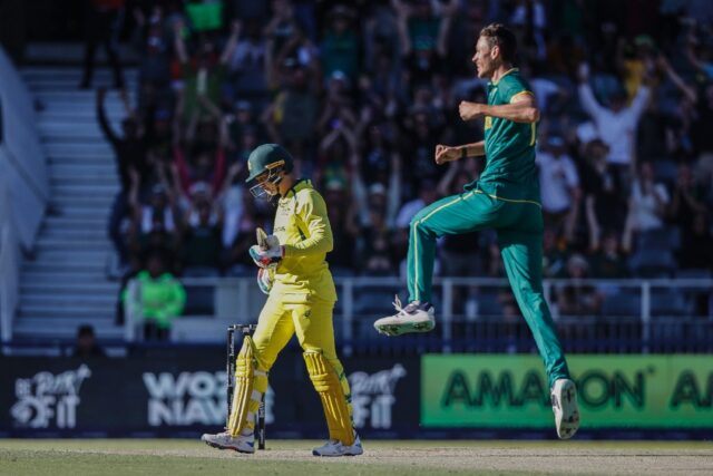 South Africa's Marco Jansen (R) celebrates after delivering a ball dismissing Australia's