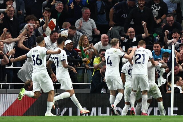 Tottenham celebrate Joel Matip's late own goal in the win against Liverpool