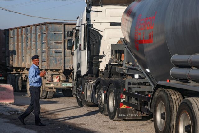 Trucks resume transit through the commercial crossing of Karm Abu Salem, or Kerem Shalom,