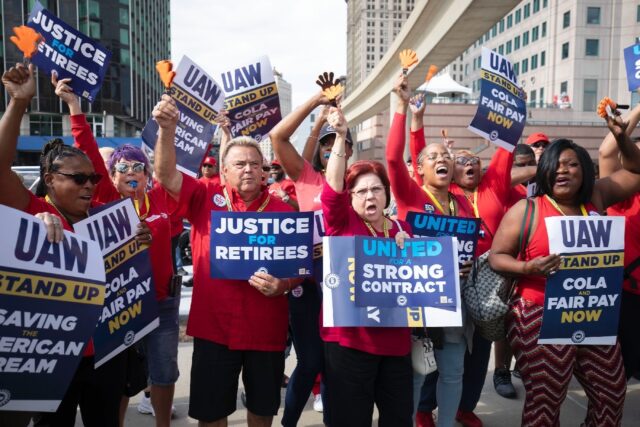 United Auto Workers members marched at a rally in downtown Detroit on September 15 after t