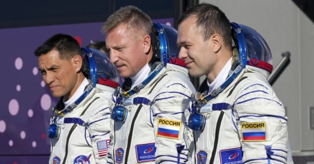 Three astronauts return to Earth after a year in space. NASA's Frank ...