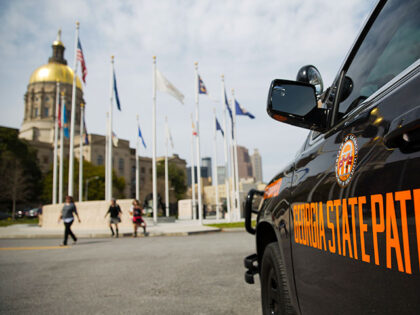 A Georgia state patrol vehicle sits outside the Capitol in Atlanta, Wednesday, March 22, 2