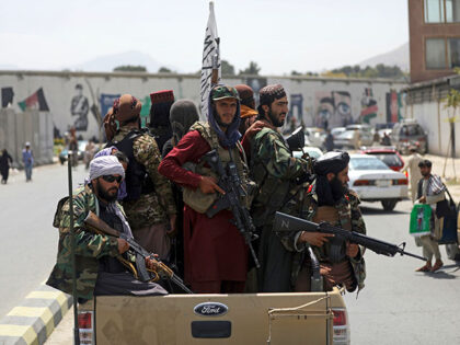 In this Aug. 19, 2021, file photo, Taliban fighters patrol in Kabul, Afghanistan. In the U