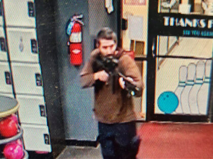In this image taken from video released by the Androscoggin County Sheriff's Office, an unidentified gunman points a gun while entering Sparetime Recreation in Lewiston, Maine, on Wednesday, Oct. 25, 2023. Maine State Police ordered residents in the state's second-largest city to shelter in place Wednesday night as the suspect …