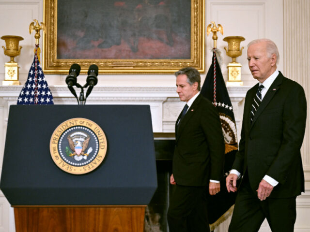 US President Joe Biden, with Secretary of State Antony Blinken, arrives to address the attacks in Israel from the State Dining Room of the White House in Washington, DC, on October 7, 2023. Biden said Saturday that US support for Israel was "rock solid and unwavering" after Palestinian militant group …