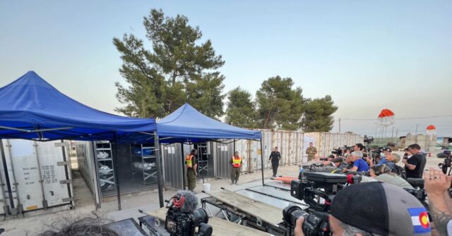 *** WARNING: GRAPHIC CONTENT *** 'This Is the Gate of Hell': Israeli Forensic Team Shows Media Bodies of Hundreds of Hamas Terror Victims