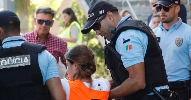 WATCH — Fed Up Portugal Drivers Haul Climate Activists off Road