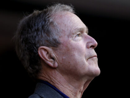 ARLINGTON, TEXAS - APRIL 27: Former President George W. Bush looks on as the Texas Rangers
