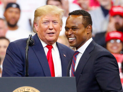 U.S. President Donald Trump, left, appears alongside Daniel Cameron, Republican candidate for Kentucky attorney general, during a rally in Lexington, Kentucky, U.S., on Monday, Nov. 4, 2019. President Trump encouraged his supporters in Kentucky to vote Tuesday to re-elect the states Republican governor, declaring it would send a message to congressional …