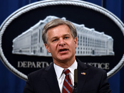 Federal Bureau of Investigation Director Christopher Wray announces significant law enforcement actions related to the illegal sale of drugs and other illicit goods and services on the Darknet during a press conference at the Department of Justice September 22, 2020 in Washington, DC. (Photo by Olivier DOULIERY / POOL / …