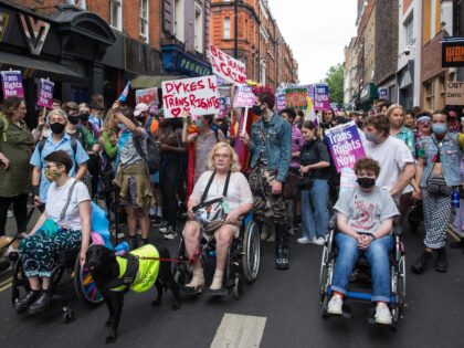 Thousands of people pass through Soho on a London Trans+ Pride march from the Wellington A