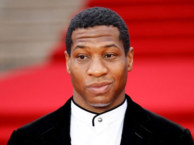 Actor Jonathan Majors poses on the red carpet after arriving to attend the World Premiere