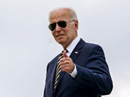 US President Joe Biden gives a thumbs up while boarding Air Force One at Joint Base Andrews, Maryland, US, on Wednesday, Aug. 10, 2022. Biden said today there are signs inflation is beginning to moderate after it slowed more than expected in July, giving him a much-needed boost ahead of …