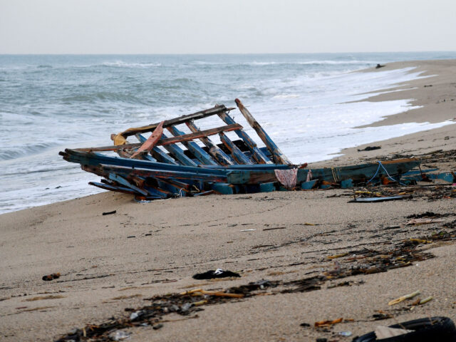 A photograph taken on February 28, 2023 shows parts of a migrants boat, washed on the beac