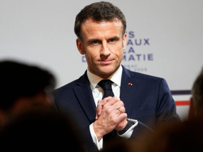TOPSHOT - French President Emmanuel Macron reacts during the National Roundtable on Diplomacy at the Foreign Ministry in Paris on March 16, 2023. - Frances Foreign Ministry is undertaking a sweeping review of its vast diplomatic corps, an effort driven by President Emmanuel Macron to adapt French diplomacy to 21st …