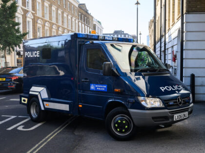 LONDON, ENGLAND - AUGUST 11: An armoured police van, believed to be carrying Aine Davis, arrives at The City of Westminster Magistrates Court on August 11, 2022 in London, England. Davis, alleged to be the fourth IS 'Beatle', was arrested at Luton Airport, Bedfordshire, after being deported to England by …
