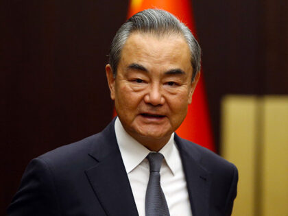 China's newly appointed Foreign Minister Wang Yi attends a meeting with his Turkish c