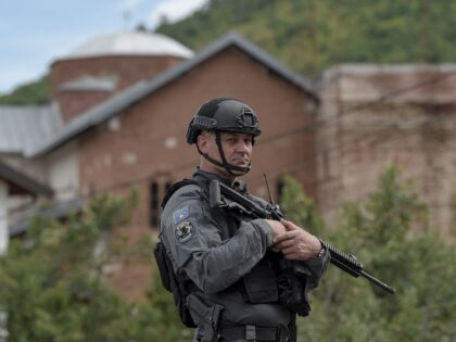A member of a Kosovo police special unit stands guard in an area around the Banjska Monast