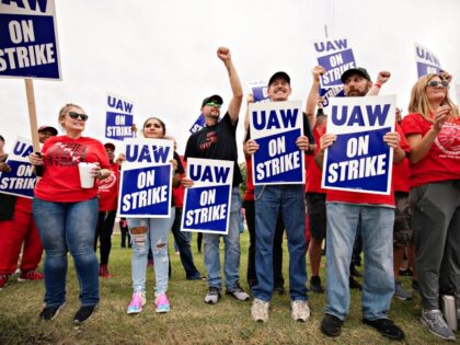 LANSING, MICHIGAN - SEPTEMBER 29: United Auto Workers members strike the General Motors La