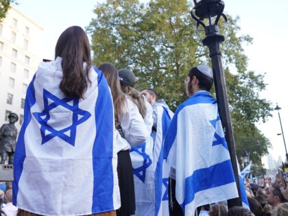 People attending a vigil outside Downing Street, central London, for victims and hostages of Hamas attacks, organised by The Board of Deputies of British Jews, as the death toll rises amid ongoing violence in Israel and Gaza following the attack by Hamas. Picture date: Monday October 9, 2023. (Photo by …