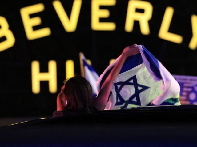 Supporters of Israel demonstrate with national flags in Beverly Hills, California on Octob