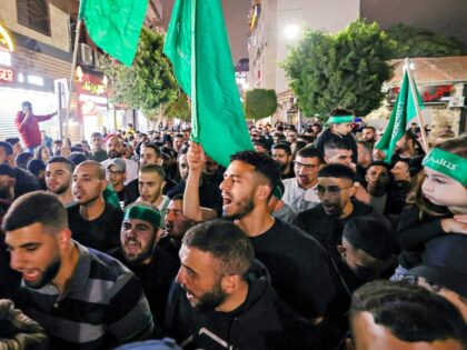 Palestinians gather in Ramallah in the occupied West Bank on October 10, 2023, to express