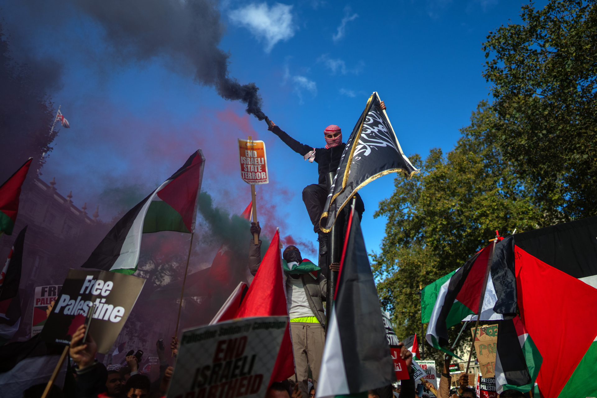 LONDON, ENGLAND - OCTOBER 14: People take part in a demonstration in support of Palestine on October 14, 2023 in London, United Kingdom.  Pro-Palestine groups protested Israel's response to Hamas attacks across the UK this weekend despite Home Secretary Suella Braverman indicating that waving Palestinian flags and using popular pro-Palestine slogans may be illegal under public order law in a letter sent To the police.  Heads in England and Wales on Tuesday.  (Photo by Karl Kort/Getty Images)