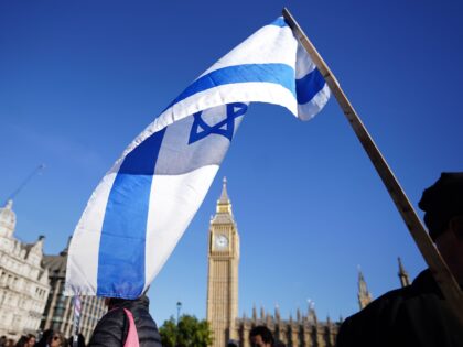 An Israeli flag at a vigil at Parliament Square in London, for victims and hostages of the