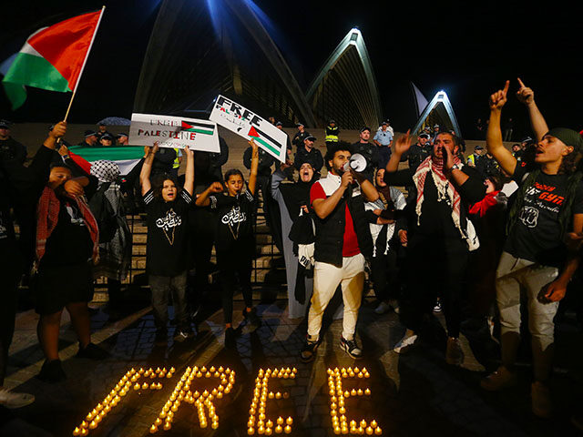 Palestine supporters rally outside the Sydney Opera House on October 09, 2023 in Sydney, A