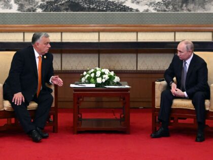 This pool photograph distributed by Russian state owned agency Sputnik shows Russia's President Vladimir Putin meeting with Hungarian Prime Minister Viktor Orban on the sidelines of the Third Belt and Road Forum in Beijing on October 17, 2023. (Photo by Grigory SYSOYEV / POOL / AFP) (Photo by GRIGORY SYSOYEV/POOL/AFP …