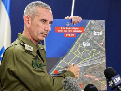 TOPSHOT - Israeli army spokesman Rear Admiral Daniel Hagari speaks to the press from The K