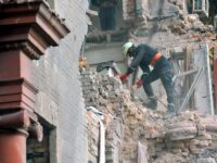 ZAPORIZHZHIA, UKRAINE - OCTOBER 19, 2023 - A rescuer removes rubble from an apartment building hit by a Russian missile Wednesday, October 18, Zaporizhzhia, southeastern Ukraine. As reported, five people were killed and five injured. (Photo credit should read Albert Kosheliev / Ukrinform/Future Publishing via Getty Images)