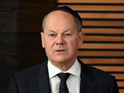 German Chancellor Olaf Scholz addresses guests during the inauguration of the Weill-Synago