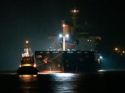 25 October 2023, Lower Saxony, Cuxhaven: The cargo ship "Polesie" is guided by t