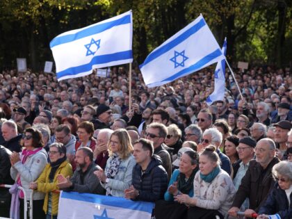 BERLIN, GERMANY - OCTOBER 22: People gather under Israeli flags at a demonstration to show solidarity with Israel and against anti-semitism on October 22, 2023 in Berlin, Germany. Thousands of people attended the event in front of the Brandenburg Gate as the conflict between Hamas and Israel continues to range …