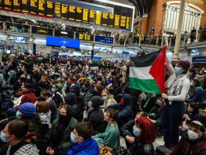 LONDON, ENGLAND - OCTOBER 31: Activists stage a mass sit down protest in Liverpool street