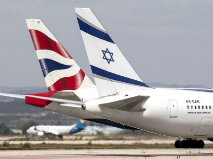 A photo taken on May 19, 2014 shows El-Al (R) and British Airways planes at Israel's