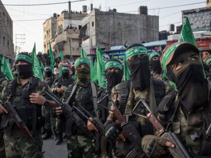 GAZA CITY, GAZA - JULY 20: Palestinian Hamas militants are seen during a military show in